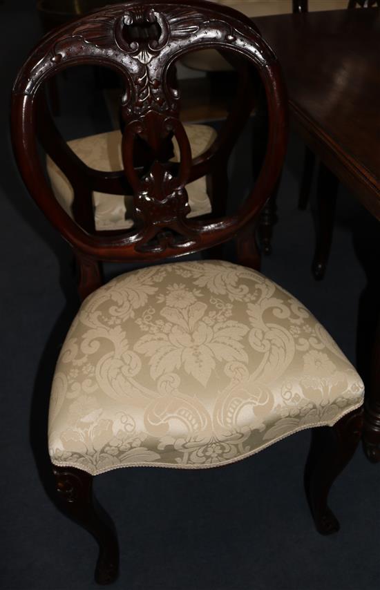 A set of six Victorian style mahogany dining chairs